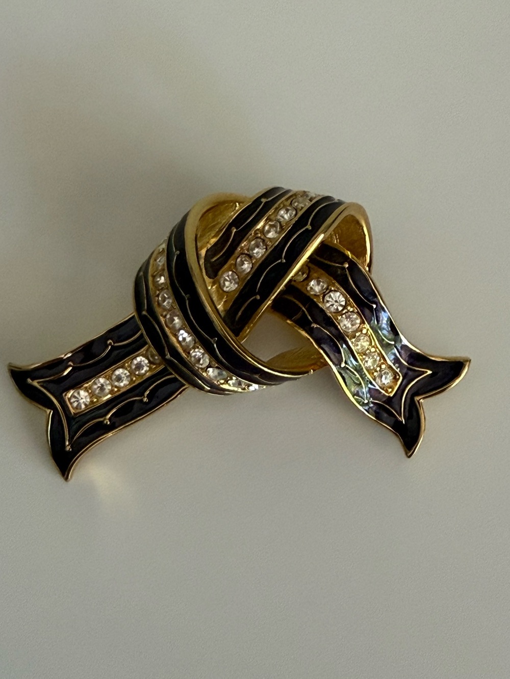 Vintage Joan Rivers Gold and Black Ribbon Knot Brooch with Clear Crystals
